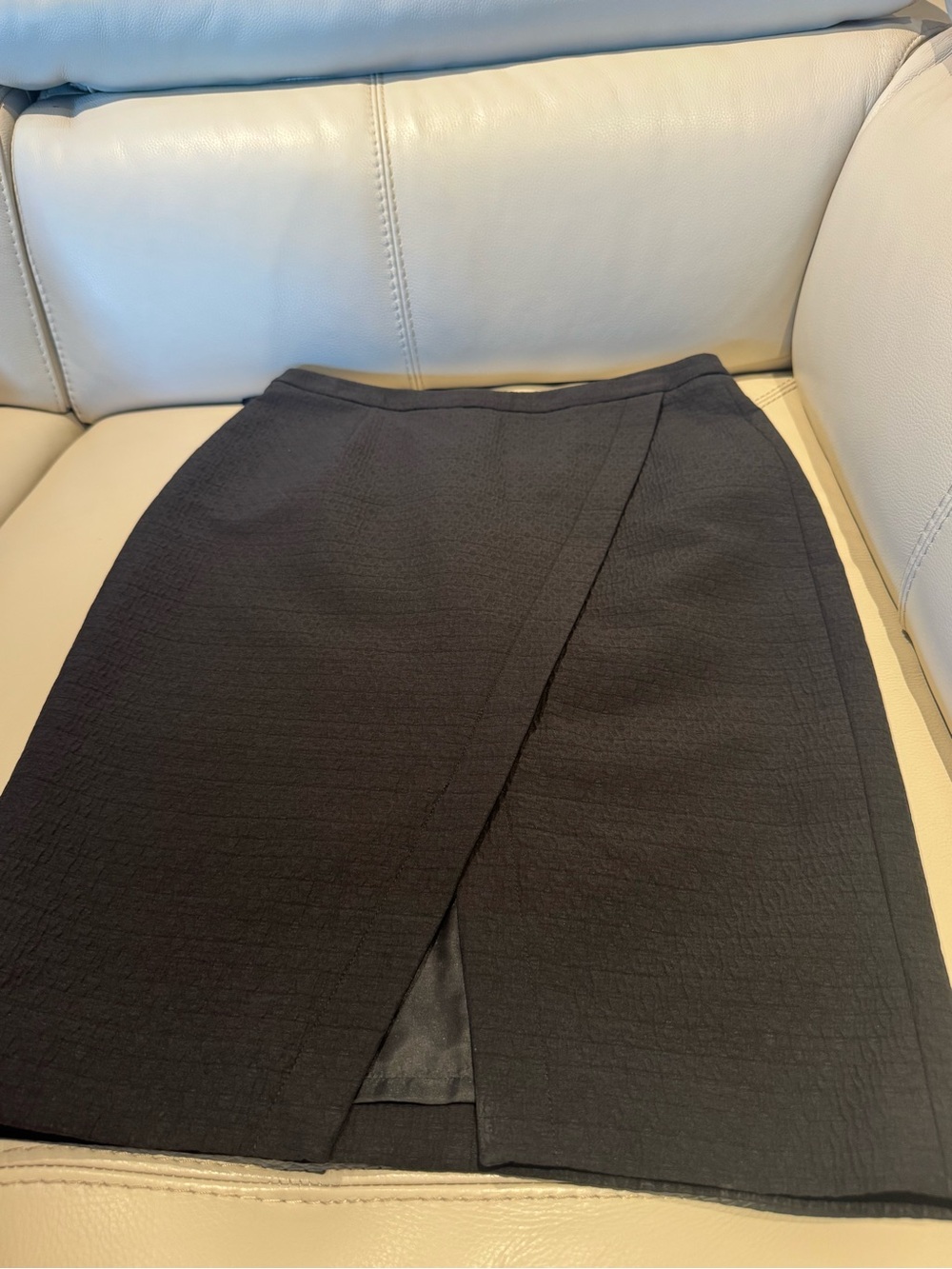 Sleek Black Pencil Skirt with Front Overlay